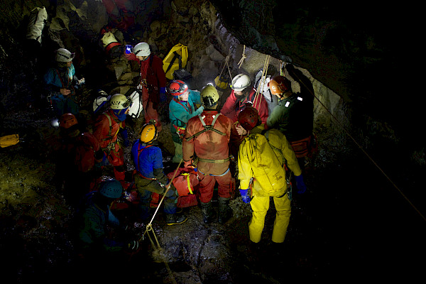 Group of cavers in the cave