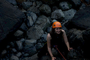 A female rockclimbing