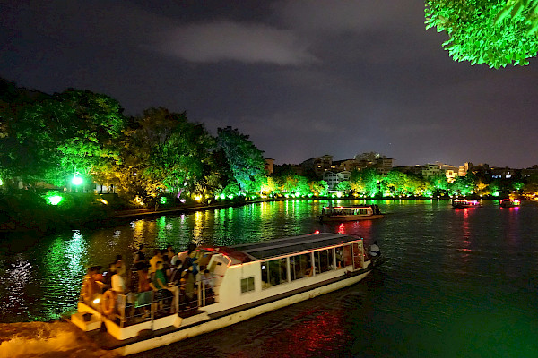 Boat on the river at night